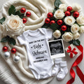 Holiday Baby Announcement Template | Digital Christmas Pregnancy Reveal with White Roses & Onesie | Festive Baby News Editable